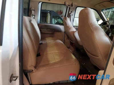 Zdjęcie 10 z 12 samochodu: 1999 FORD F350 SUPER DUTY VIN:1FTWW32S9XEF00535 - miniatura