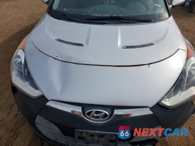 Zdjęcie 11 z 12 samochodu: 2012 HYUNDAI VELOSTER BASE VIN:KMHTC6AD2CU064283 - miniatura