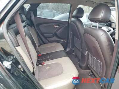Zdjęcie 11 z 14 samochodu: 2010 HYUNDAI TUCSON GLS VIN:KM8JU3AC9AU060139 - miniatura