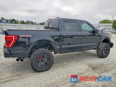 Trzecie zdjęcie samochodu z tyłu: 2023 FORD F150 SUPERCREW VIN:1FTFW1E54PFA93227 - miniatura