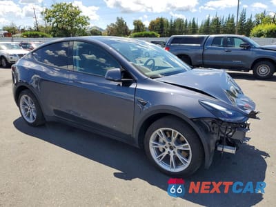 Czwarte zdjęcie samochodu z boku: 2023 TESLA MODEL Y VIN:7SAYGDEEXPA194719 - miniatura