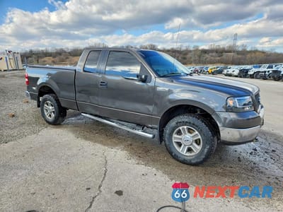 Czwarte zdjęcie samochodu z boku: 2005 FORD F150 VIN:1FTPX14505FB65511 - miniatura