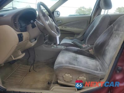 Zdjęcie 7 z 12 samochodu: 2003 NISSAN SENTRA XE VIN:3N1CB51D63L816016 - miniatura