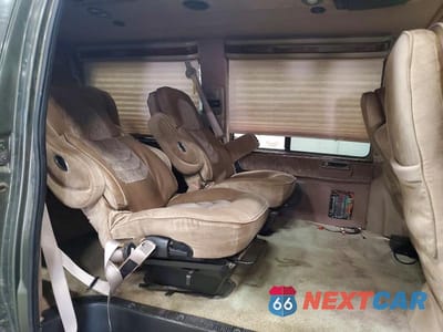Zdjęcie 11 z 14 samochodu: 2002 FORD ECONOLINE E150 VAN VIN:1FDRE14L12HA10880 - miniatura