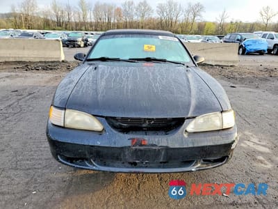 Piąte zdjęcie samochodu w środku: 1997 FORD MUSTANG VIN:1FALP444XVF151502 - miniatura