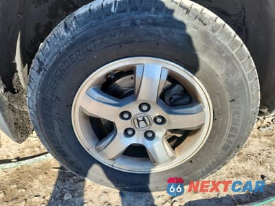 Zdjęcie 10 z 12 samochodu: 2006 HONDA PILOT EX VIN:2HKYF18576H531344 - miniatura
