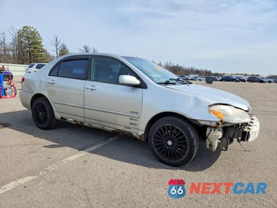 Czwarte zdjęcie samochodu z boku: 2003 TOYOTA COROLLA LE VIN:2T1BR32E13C000656 - miniatura