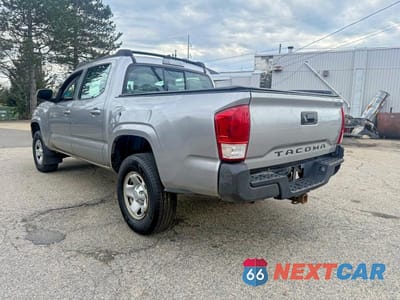 Trzecie zdjęcie samochodu z tyłu: 2016 TOYOTA TACOMA SR VIN:5TFAX5GNXGX065163 - miniatura