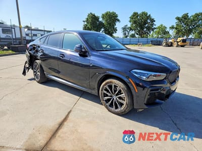 Czwarte zdjęcie samochodu z boku: 2023 BMW X6 XDRIVE40I VIN:5UXCY6C06P9N71775 - miniatura