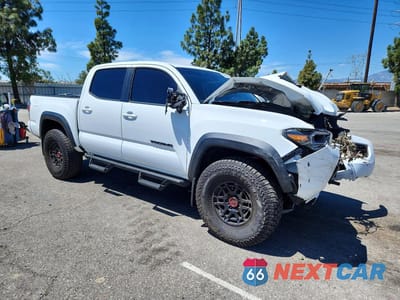 Czwarte zdjęcie samochodu z boku: 2022 TOYOTA TACOMA TRD PRO VIN:3TYCZ5AN6NT101756 - miniatura