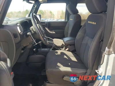 Zdjęcie 7 z 14 samochodu: 2015 JEEP WRANGLER SAHARA VIN:1C4AJWBG2FL620497 - miniatura