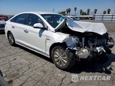 Czwarte zdjęcie samochodu z boku: 2016 HYUNDAI SONATA HYBRID SE VIN:KMHE24L1XGA023328 - miniatura