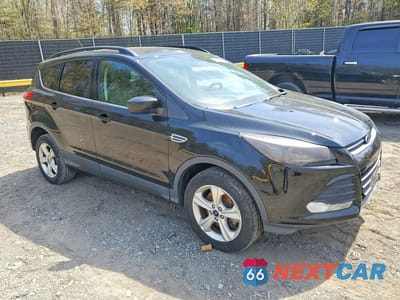 Czwarte zdjęcie samochodu z boku: 2016 FORD ESCAPE SE VIN:1FMCU9G90GUC74517 - miniatura