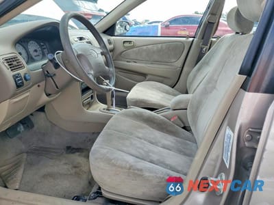 Zdjęcie 7 z 11 samochodu: 2000 TOYOTA COROLLA VE VIN:2T1BR12E2YC302209 - miniatura