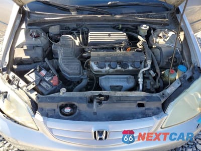 Zdjęcie 11 z 12 samochodu: 2002 HONDA CIVIC LX VIN:1HGES16552L072730 - miniatura