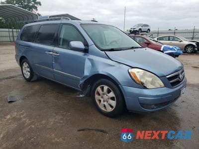 Czwarte zdjęcie samochodu z boku: 2007 HYUNDAI ENTOURAGE GLS VIN:KNDMC233476024819 - miniatura