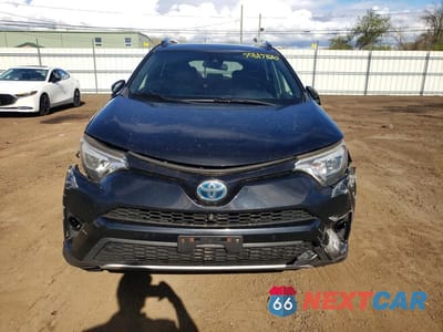 Piąte zdjęcie samochodu w środku: 2017 TOYOTA RAV4 HV SE VIN:JTMJJREV0HD087400 - miniatura