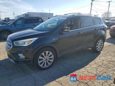 2017 FORD ESCAPE TITANIUM 1FMCU9JD6HUD56539 - główne zdjęcie licytacji z USA - miniatura