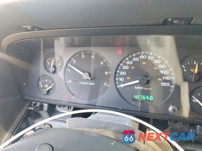 Zdjęcie 9 z 13 samochodu: 2004 JEEP GRAND CHEROKEE LAREDO VIN:1J4GW48S64C127375 - miniatura