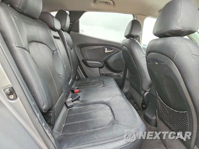 Zdjęcie 11 z 14 samochodu: 2013 HYUNDAI TUCSON LIMITED VIN:KM8JUCAC7DU621507 - miniatura