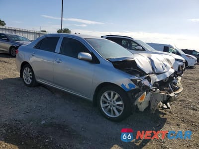 Czwarte zdjęcie samochodu z boku: 2010 TOYOTA COROLLA LE VIN:1NXBU4EE2AZ292247 - miniatura