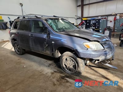 Czwarte zdjęcie samochodu z boku: 2006 MITSUBISHI OUTLANDER LS VIN:JA4LZ31F66U600654 - miniatura