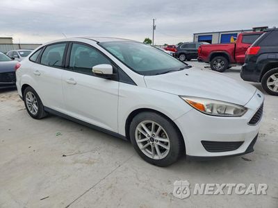 Czwarte zdjęcie samochodu z boku: 2017 FORD FOCUS SE VIN:1FADP3F28HL315734 - miniatura