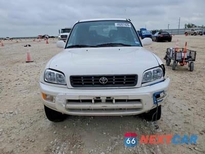 Piąte zdjęcie samochodu w środku: 1999 TOYOTA RAV4 BASE VIN:JT3HP10V1X7137650 - miniatura