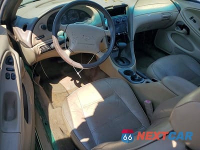 Zdjęcie 8 z 13 samochodu: 1999 FORD MUSTANG VIN:1FAFP4041XF190923 - miniatura