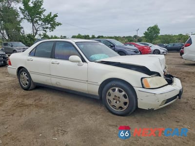 Czwarte zdjęcie samochodu z boku: 2001 ACURA 3.5RL VIN:JH4KA96621C002353 - miniatura