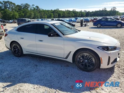 Czwarte zdjęcie samochodu z boku: 2023 BMW I4 EDRIVE 35 VIN:WBY43AW09PFP74985 - miniatura