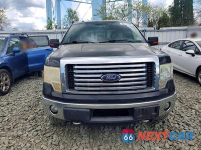 Piąte zdjęcie samochodu w środku: 2011 FORD F150 SUPERCREW VIN:1FTFW1ET1BKE12842 - miniatura