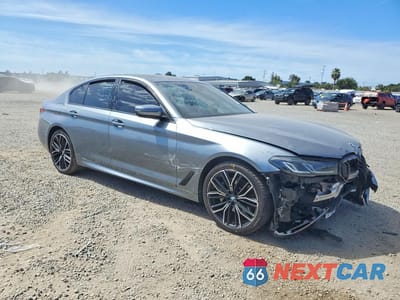 Czwarte zdjęcie samochodu z boku: 2021 BMW 530E VIN:WBA13AG04MCF28779 - miniatura