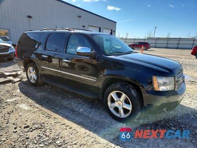 Czwarte zdjęcie samochodu z boku: 2010 CHEVROLET SUBURBAN K1500 LTZ VIN:1GNUKKE3XAR100864 - miniatura