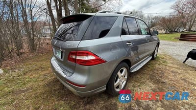 Czwarte zdjęcie samochodu z boku: 2014 MERCEDES-BENZ ML 550 4MATIC VIN:4JGDA7DBXEA299058 - miniatura