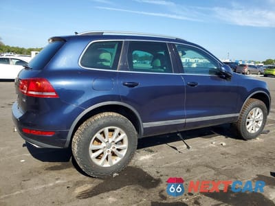 Trzecie zdjęcie samochodu z tyłu: 2013 VOLKSWAGEN TOUAREG V6 TDI VIN:WVGEP9BP2DD004450 - miniatura