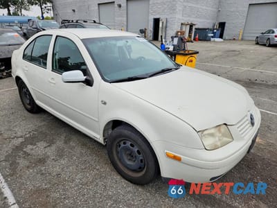 Czwarte zdjęcie samochodu z boku: 2003 VOLKSWAGEN JETTA GL VIN:3VWRK69M23M044526 - miniatura