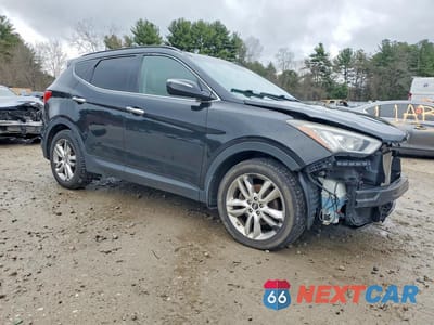 Czwarte zdjęcie samochodu z boku: 2014 HYUNDAI SANTA FE SPORT 2.0T VIN:5XYZWDLA5EG132626 - miniatura