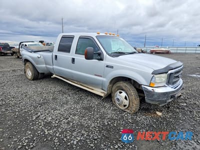 Czwarte zdjęcie samochodu z boku: 2004 FORD F350 SUPER DUTY VIN:1FTWW33P04ED27395 - miniatura