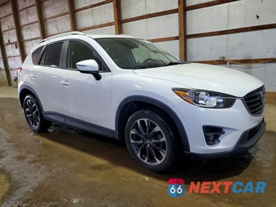 Czwarte zdjęcie samochodu z boku: 2016 MAZDA CX-5 GT VIN:JM3KE4DY9G0890761 - miniatura