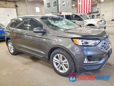 Czwarte zdjęcie samochodu z boku: 2019 FORD EDGE SEL VIN:2FMPK4J93KBC36488 - miniatura