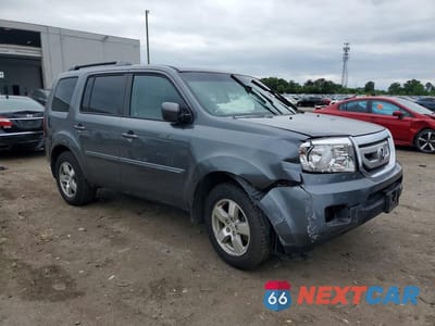 Czwarte zdjęcie samochodu z boku: 2011 HONDA PILOT EXL VIN:5FNYF4H50BB076329 - miniatura