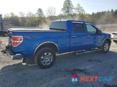 Trzecie zdjęcie samochodu z tyłu: 2013 FORD F150 SUPERCREW VIN:1FTFW1EF7DFD43385 - miniatura