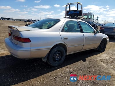 Trzecie zdjęcie samochodu z tyłu: 1999 TOYOTA CAMRY LE VIN:4T1BG22K5XU453124 - miniatura
