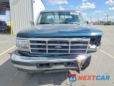 Piąte zdjęcie samochodu w środku: 1997 FORD F350 VIN:1FTJW35F4VEB01568 - miniatura