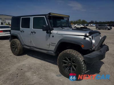 Czwarte zdjęcie samochodu z boku: 2010 JEEP WRANGLER UNLIMITED SPORT VIN:1J4BA3H14AL196958 - miniatura