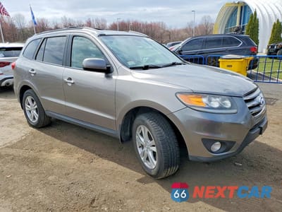 Czwarte zdjęcie samochodu z boku: 2012 HYUNDAI SANTA FE LIMITED VIN:5XYZKDAG7CG094929 - miniatura