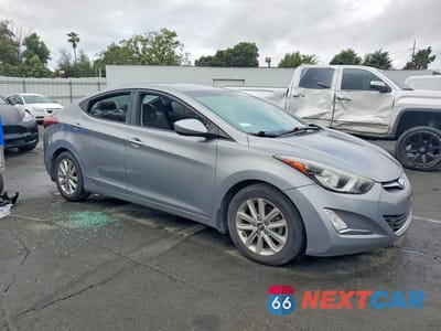 Czwarte zdjęcie samochodu z boku: 2015 HYUNDAI ELANTRA SE VIN:KMHDH4AE6FU355005 - miniatura