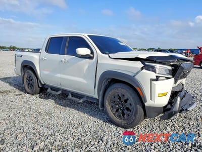 Czwarte zdjęcie samochodu z boku: 2022 NISSAN FRONTIER PRO-X VIN:1N6ED1EJ9NN678772 - miniatura