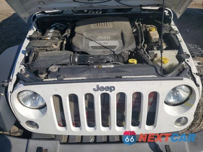 Zdjęcie 12 z 13 samochodu: 2016 JEEP WRANGLER UNLIMITED SPORT VIN:1C4BJWDG1GL248072 - miniatura